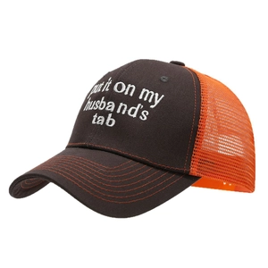 Brown and orange trucker hat featuring white embroidered text on the front panel