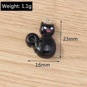 Detail view of black cartoon cat pendant with weight 1.1g and size 23mm x 16mm specs