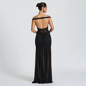 Elegant backless black mesh dress with ruched details and a side slit for formal events