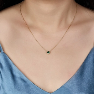 Elegant 925 silver necklace with a green zircon pendant on a gold-plated chain