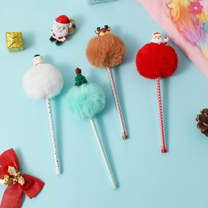 Flat lay detail of colorful Christmas plush ball pens with snowman and reindeer charms