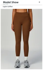 Detailed view of women high waist yoga leggings in light coffee brown with elastic fit