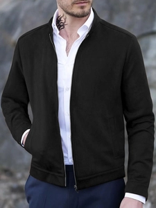 Detail shot of men's black slim fit stand collar jacket with silver metal zipper