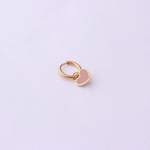 Detailed view of a gold hoop earring with a sweet pink heart oil drop pendant charm