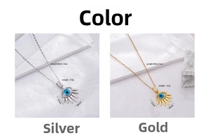 Detail view of gold and silver Evil Eye pendants with dimensions and chain lengths