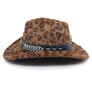 Macro shot of leopard print wool jazz hat featuring black leather belt with metal badge