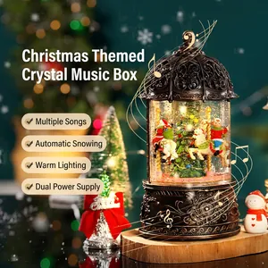Vintage bronze Christmas carousel music box with snow fountain and warm glowing lights