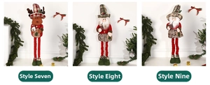 Detail view of three retractable Christmas dolls featuring reindeer and Santa Claus styles