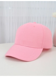 Detailed macro view of the premium pink cotton canvas fabric texture on a baseball cap