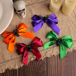 Lot de quatre barrettes à cheveux Halloween avec nœuds et araignées colorées en satin