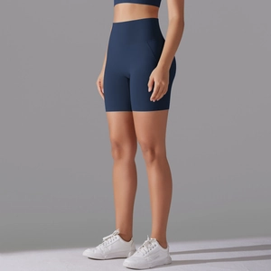Detailed side view showing navy blue high-waisted yoga shorts with seamless elastic fabric