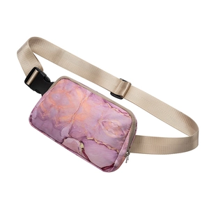 Detail of purple marble pattern lightweight waterproof waist bag with beige strap