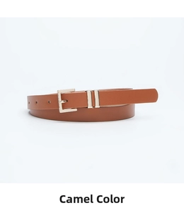 Detail of camel leather skinny belt with golden square buckle and dual metal loops