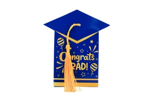 Detailed view of graduation cap candy box with yellow tassel and Congrats Grad text