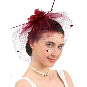 Elegant wine red bridal fascinator hat with feathers, flowers and polka dot mesh veil