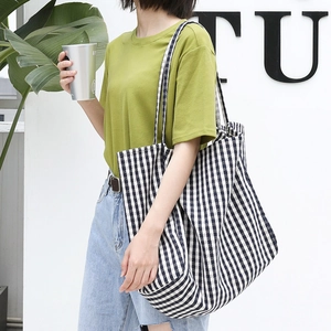 Classic large check print canvas tote bag with slim shoulder straps in casual style