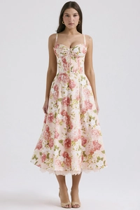 Detail showing the floral print bodice with lace trim on the hem of the summer dress