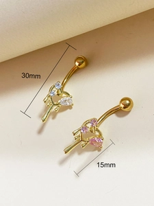 Detailed view of pink zircon heart navel ring in gold finish with 30mm size measurements