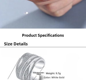 Macro detail of wide layered wave ring with white zircon stones and 16mm inner diameter
