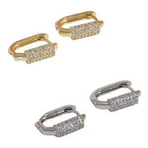 U-shaped crystal earrings set in gold and silver finish with pave-set rhinestones