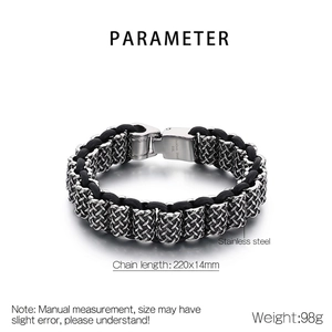 Detail showing 316L stainless steel engraving on punk braided leather and steel bracelet