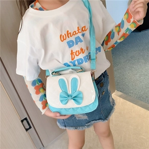 Cute kids crossbody bag in white and sky blue with bunny ears and bow accent