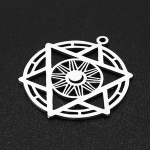 Macro shot of silver stainless steel hexagram moon and sun pendant for DIY jewelry