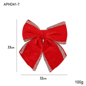 Detail view of 33x32cm red velvet Christmas bow decoration with silver glitter edges