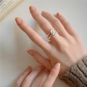Elegant 925 sterling silver interlocking double-band ring with minimalist design