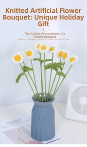 Detail of handmade crochet white daisy bouquet in a blue geometric vase for home decor