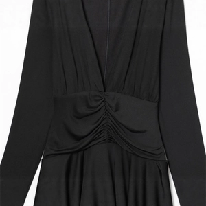 Detail of deep V-neckline and ruched waist on black long sleeve dress with silky finish