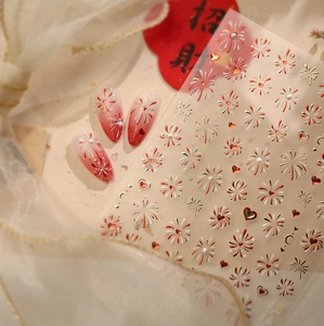 Detail of red and white heart fireworks nail stickers with 3D pearl decorations