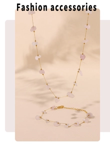 Detail of pink natural stone jewelry set with golden stainless steel handmade chain