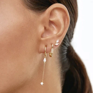 Three-piece gold ear stud set with marquise zircon fringe and small hoop earring on model