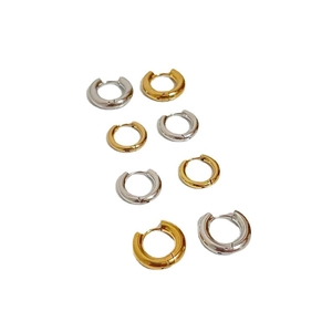 Polished stainless steel hoop earrings in gold and silver finish on white background