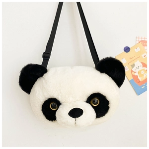 Detailed view of plush panda shoulder bag with soft black and white faux fur and adjustable strap