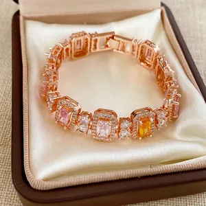 Rose gold bracelet with rectangular zircon stones in pink and yellow colors