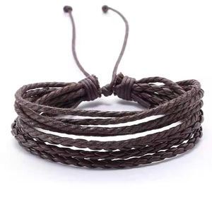 Close-up of dark brown multi-layer braided leather bracelet with adjustable drawstrings