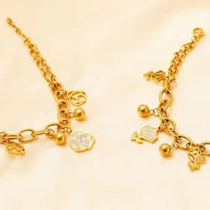 Elegant 18k gold plated stainless steel bracelet with hollow rose and rhinestone flowers