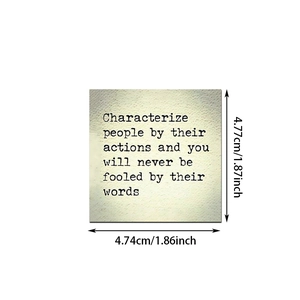 Close-up of square quote sticker with dimensions 4.7cm showing vintage paper texture