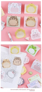Close-up of cute animal-shaped sticky notes featuring rabbits and bears in soft pastel colors