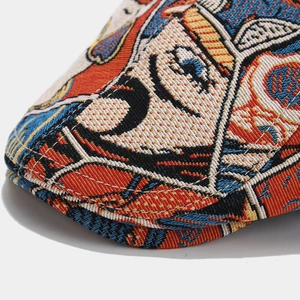 Close-up of jacquard fabric ivy cap with colorful comic style artistic pattern