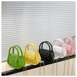 Mini macaron jelly bags in five colors with glossy finish and gold chain straps