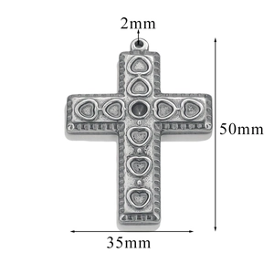 Detailed silver cross pendant with heart relief and 50mm x 35mm dimensions overview