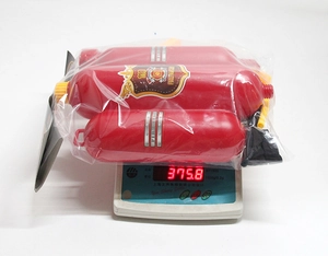 Weight measurement of 375.8g for fire fighter backpack water gun toy in packaging