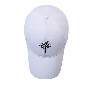 White cotton baseball cap featuring black tree embroidery and adjustable curved brim