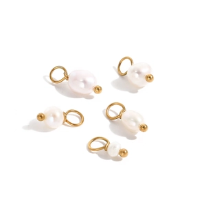 Detailed view of 14K gold plated titanium charms with white baroque pearls for DIY jewelry