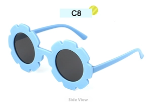 Side view of sky blue flower-shaped sunglasses for kids with grey round lenses