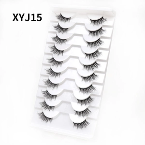 Close-up of 10 pairs of natural curly cat-eye false eyelashes in white tray XYJ15