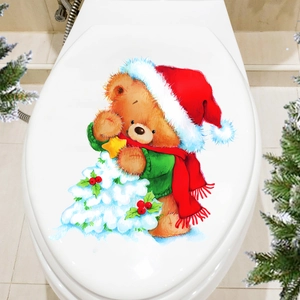 Christmas toilet lid sticker featuring a cute teddy bear with tree and festive red hat